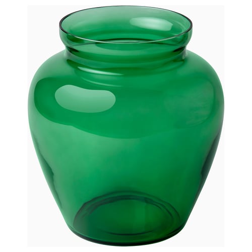 Aromatik vas i grönt glas. Mjuk organisk form med bred öppning. Munblåst hantverk.