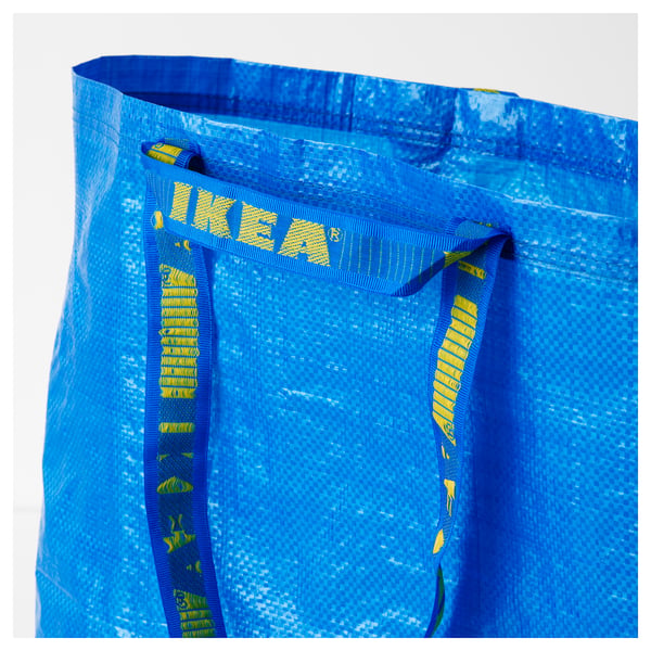 Blå ikea återanvändbar shoppingkasse med starka handtag, designad för hållbarhet och praktisk användning.