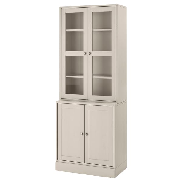 Elegant HAVSTA ljusbeige skåp med glasdörrar, massiv furu, rustik stil för att visa upp föremål.