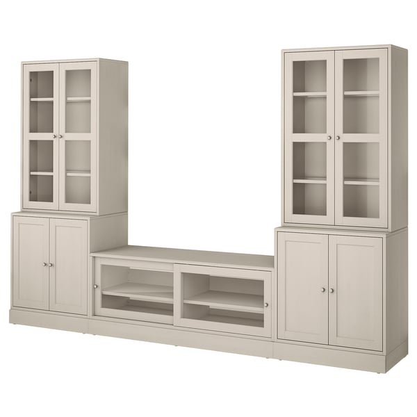 Beige HAVSTA tv-bänk: glasdörrar, furu, skandinavisk rustik design.