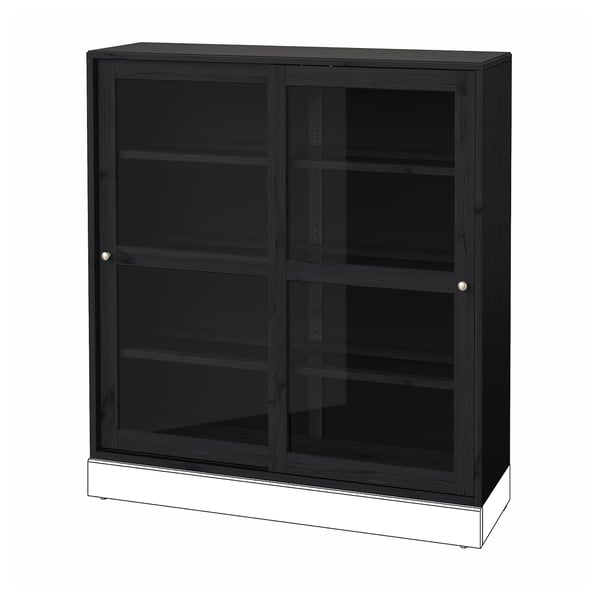 Svart HAVSTA dörrskåp i glas med ram och hyllor i mörkt trä. Fyrkantig form, enkel och modern design.