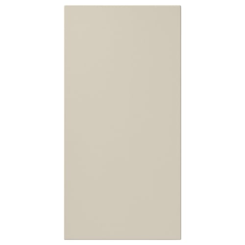 Beige HAVSTORP dörr, slät och rektangulär, material av träfiberplatta, rena linjer, modern design.