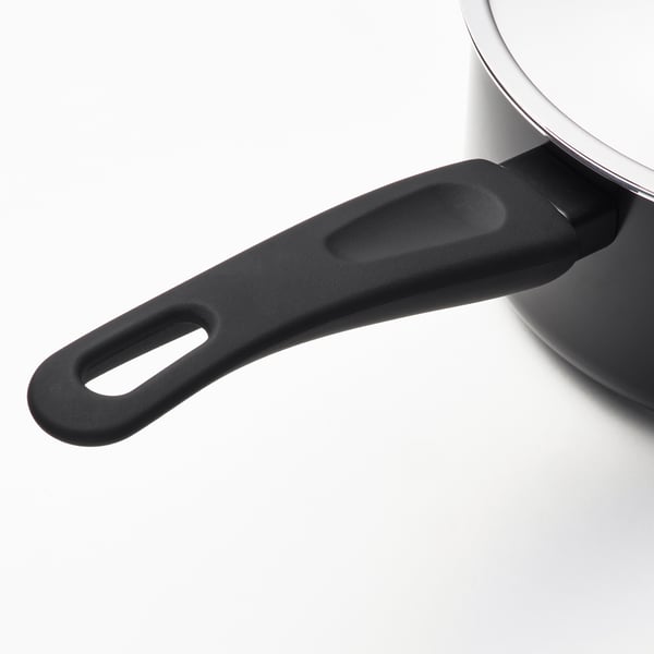 Modernt kastrullhandtag, elegant svart, ergonomiskt med säkert grepp.