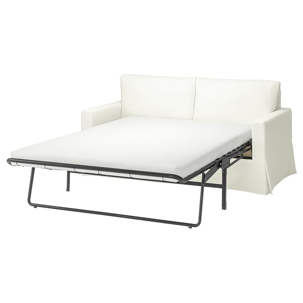 Vit, modern bäddsoffa, rena linjer, metallram.