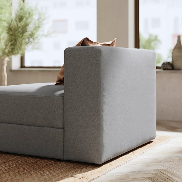 Modern grå JÄTTEBO soffa, snygg design, mjukt tyg, rena linjer, perfekt för avkoppling.