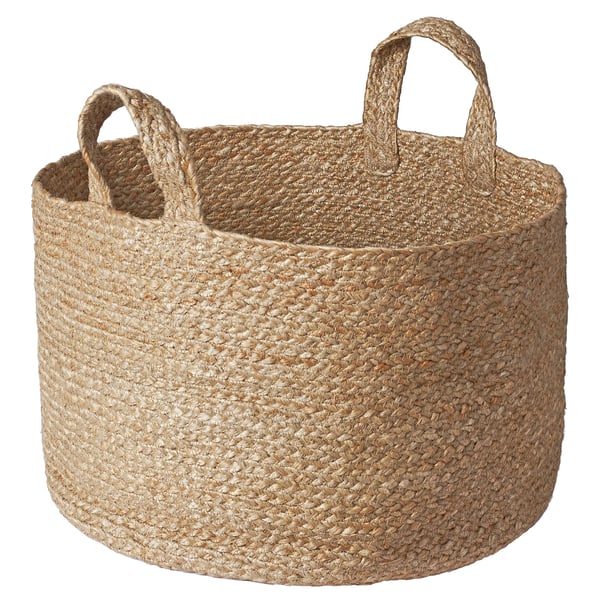 Handvävd beige juteförvaringskorg med handtag, perfekt för organisering och dekoration.