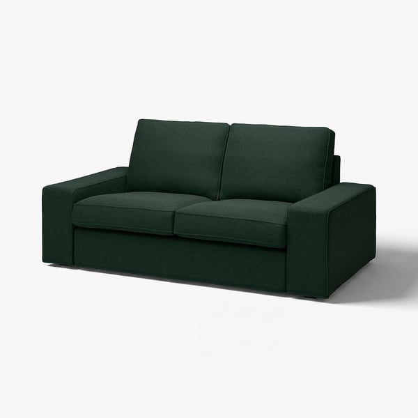 KIVIK-soffa: djupgrön, kantig design, mjuk klädsel; mysigt och inbjudande.