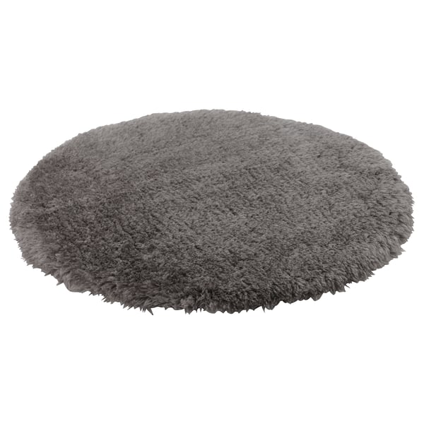 Rund grå stolsdyna, mjuk och fluffig, återvunnen polyester, halkfri botten.
