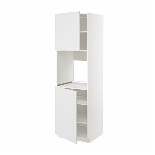 Ett vitt ikea METOD köksskåp med en öppen lucka som avslöjar justerbara hyllplan.