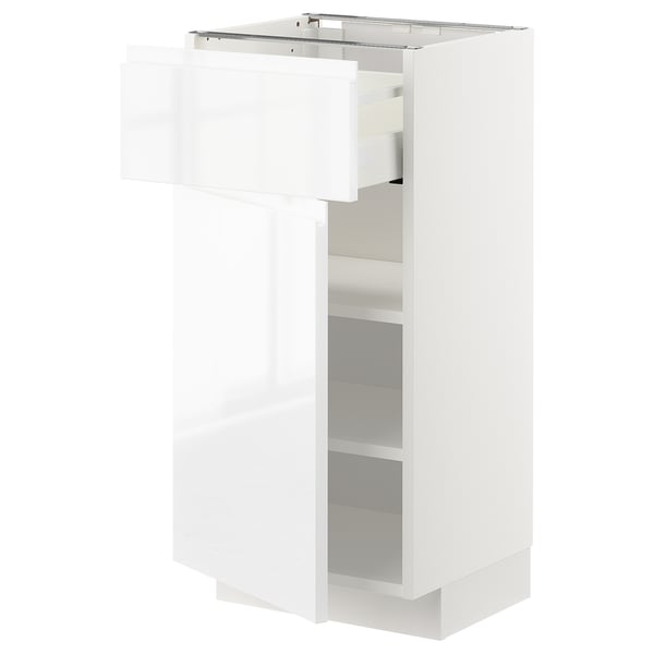 Vitt METOD köksskåp med högblank yta, elegant modern design.