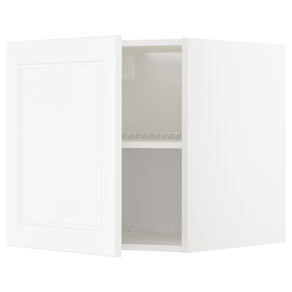 Vitt köksskåp med öppen dörr, som visar hyllor, del av serien METOD, minimalistisk design.