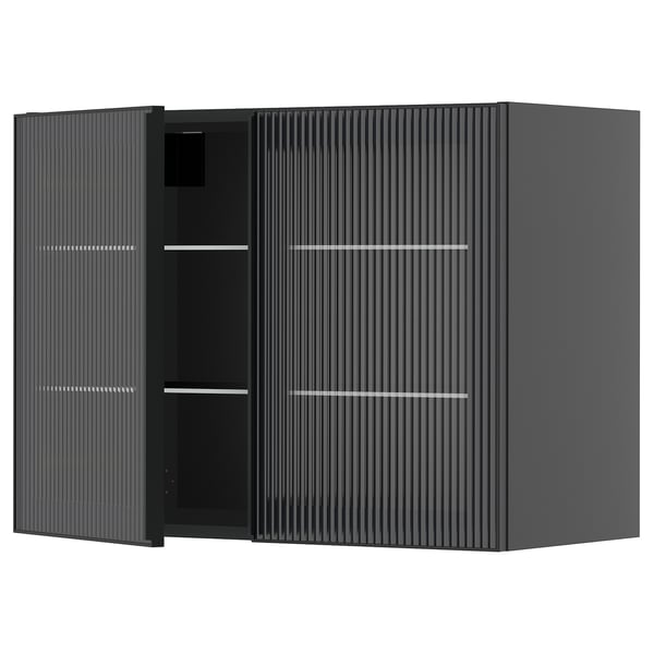 Modernt svart köksskåp med eleganta glasdörrar och vertikala linjer, med en minimalistisk design.