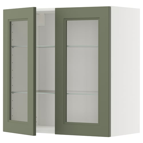 Elegant grönt vägghängt skåp med glasdörrar, elegant design och justerbara hyllor. Perfekt för moderna kök.