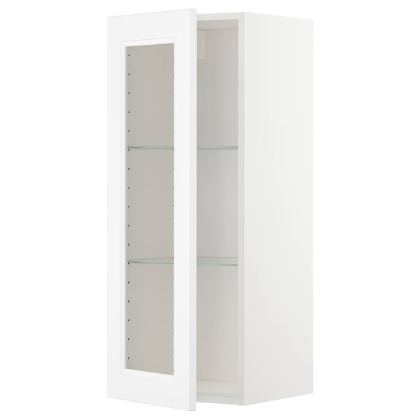 Vitt väggskåp, glashyllor, modern design, köksförvaring.