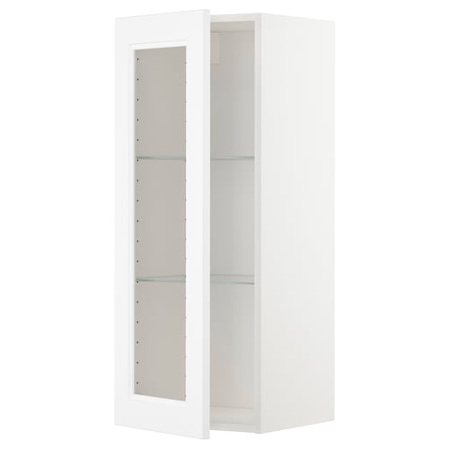 Vitt väggskåp, glashyllor, modern design, köksförvaring.
