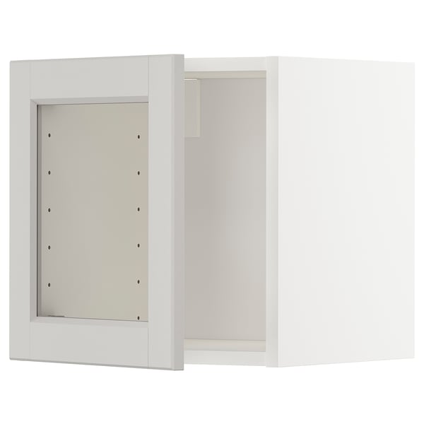 METOD väggskåp, vitt, rektangulärt, modern minimalistisk design med en öppen dörr.