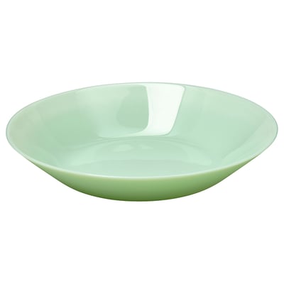 Grön glasskål, modern design, släta kanter.