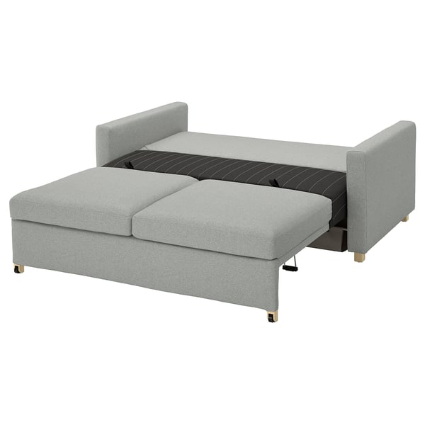 En grå SALTSJÖBADEN futonbädd med slanka ben och minimalistisk design.