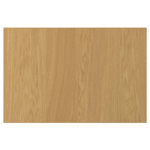 En SINARP trädörr i ekfanér med naturlig finish. Den har en enkel, rektangulär design med en massiv ekkant för stabilitet.