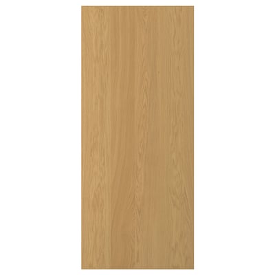 SINNARAB, en ljusbrun trädörr. Den är gjord av ekfanér med en massiv ekkant, med en elegant rektangulär design.
