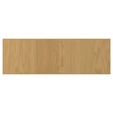 En ljus träpanel med ådringsdetaljer.