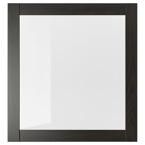 Ett SINDVIK svartbrunt skåp med front i klarglas. Den har en modern, enkel design och är gjord av träfiberskiva och härdat glas.