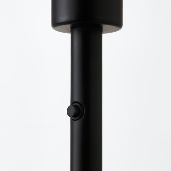 Svart modern lampfot med snygg design och justerbar knapp.