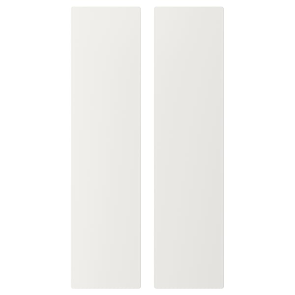Två vita rektangulära dörrar sida vid sida, enkel och modern design.