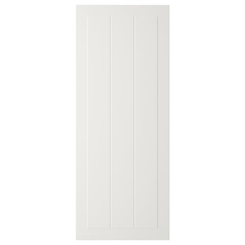 En vit, rektangulär STENSUND-dörr med vertikala spår, gjord av fiberplatta, lackerad för enkel rengöring.