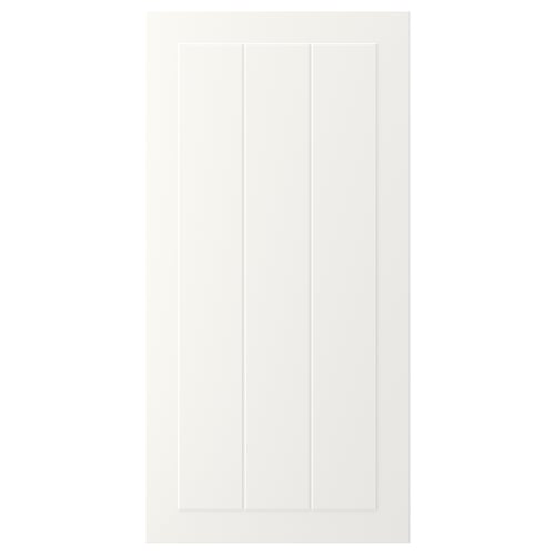 En vit STENSUND skåpdörr med en slät, rektangulär design med vertikala räfflade paneler och ett inramat utseende.