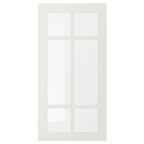 En vit STENSUND skåpdörr med en glaspanel uppdelad i fyra sektioner med träramar, designad för köksbruk.