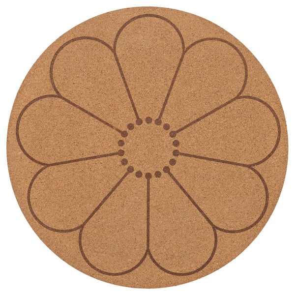 Rund bordstablett i kork med brun blommig design.