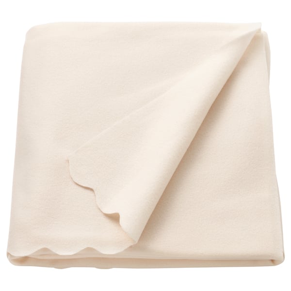 Vikt benvit fleecefilt, mjuk och varm, tillverkad av återvunnen polyester.