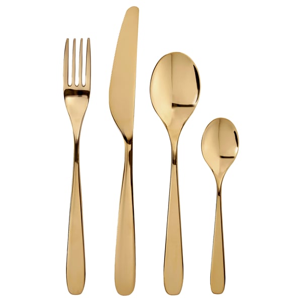 Gyllene bestickset: gaffel, kniv, stor sked, liten sked. Elegant, glänsande mässingsfinish, modern design.
