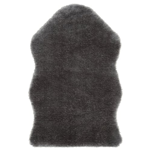 Mörkgrå TOFTLUND fårskinnsfäll i konstläder, rektangelform, mjuk och fluffig textur.