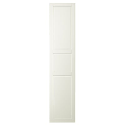 En krämfärgad TYSSEDAL skåpdörr med paneldesign och rundade kanter.