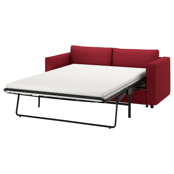 En röd VIMLE bäddsoffa med en vit madrass, med en metallram och en modern design.