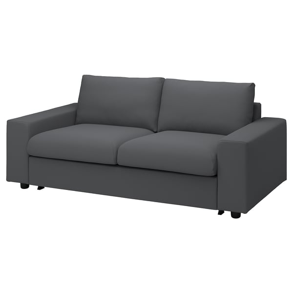 En grå VIMLE 2-sits bäddsoffa med rena linjer och plyschkuddar.