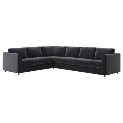 Modern mörkgrå l-formad sektionssoffa i sammet, elegant och minimalistisk design.