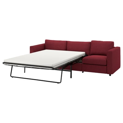 Röd bäddsoffa med förlängningsmadrass, modern design.