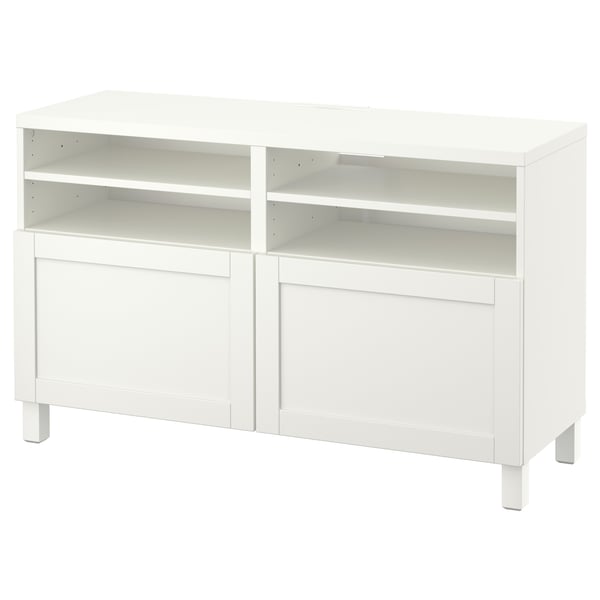 A white BESTÅ tv bench with two cabinets and open shelves. It clean lines and a minimalist design for modern spaces.
