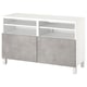 A white BESTÅ tv bench with grey concrete-effect doors, offering storage and cable management.