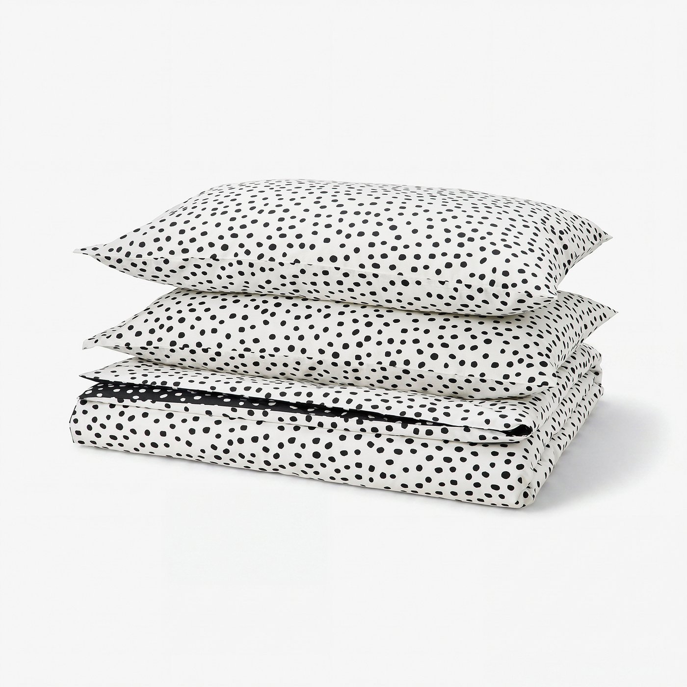 A BJÖRKGRÅMAL duvet cover set in white with black dots, made from 54% cotton and 46% viscose. It a soft, patterned design with a zip closure.