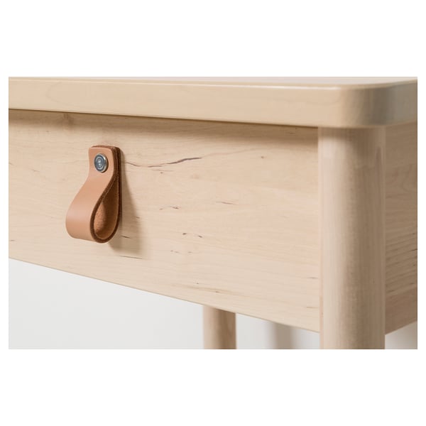 Wooden drawer with smooth leather handle. Durable and stylish design.