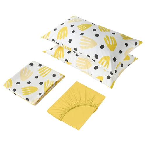 Three yellow and white patterned bed linens: two pillowcases and a fitted sheet, neatly folded. Abstract handprints and dots.