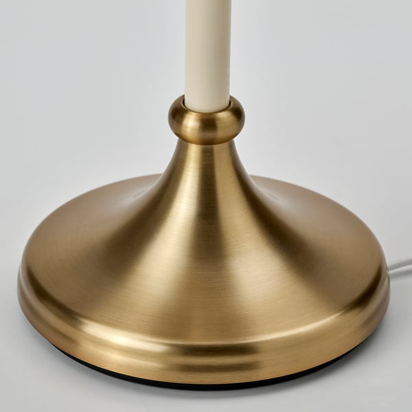 Golden lamp base, sleek design, quality finish.