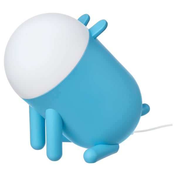 Blue 3d cartoonish lamp with a rounded body, legs, and arms, has a white wire and bulb.