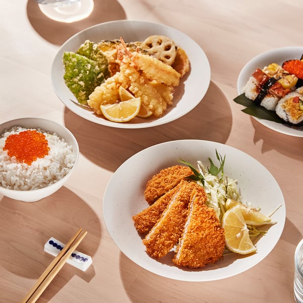 Japanese meal: rice, tempura, fish, sushi, chopsticks