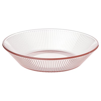 Pink glass dinner plate with linear patterns.