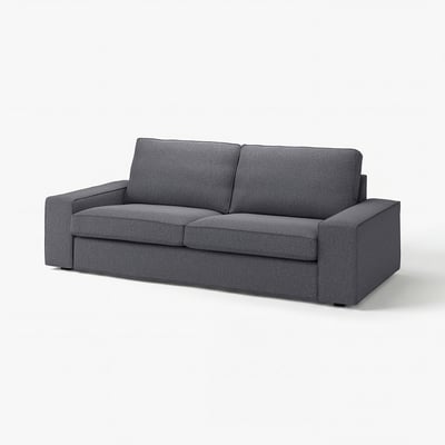 A modern grey fabric sofa with clean lines and boxy cushions, depicting contemporary style.